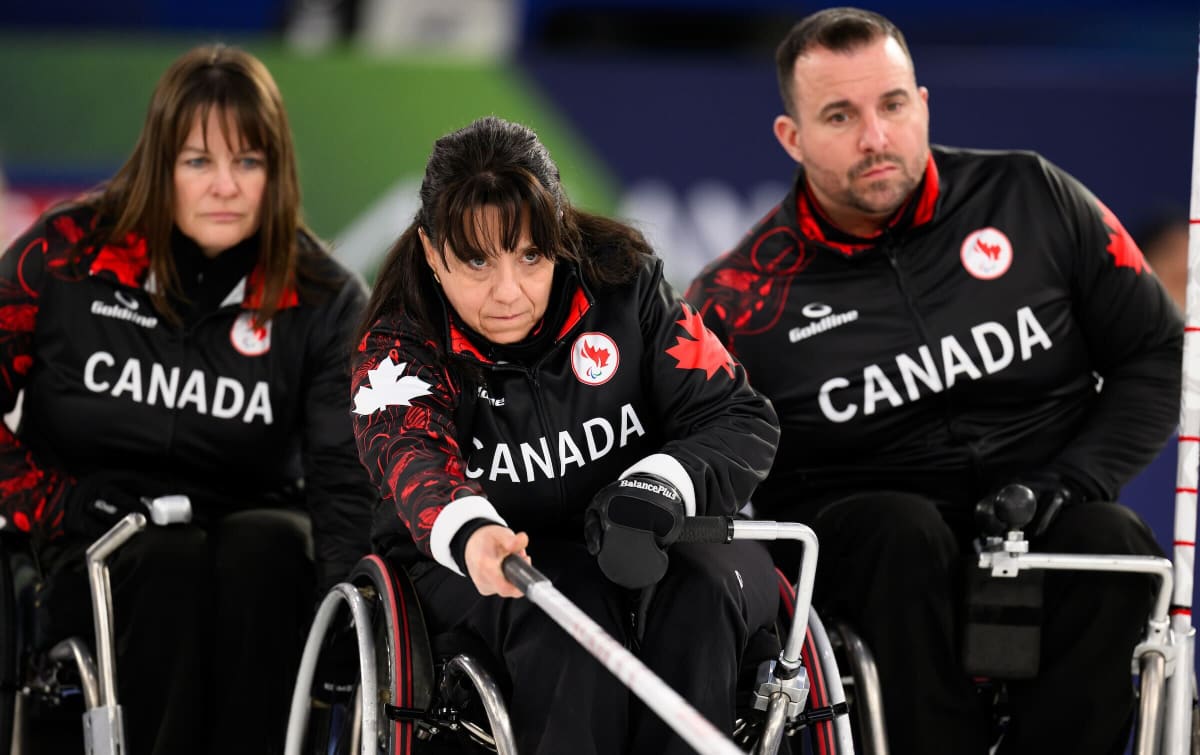 Collinda Joseph delivers a curling stone during the 2026 Paralympic wheelchair curling gold medal game