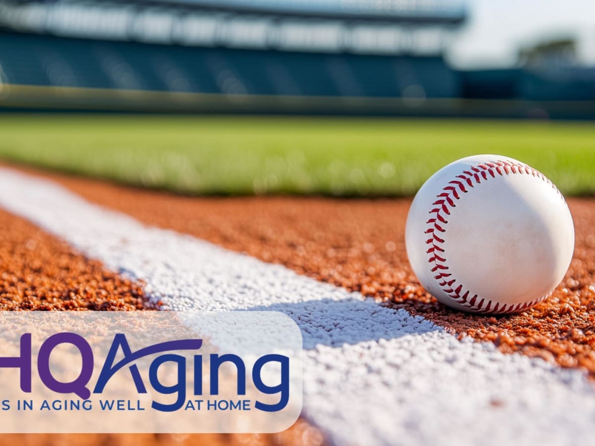 Volunteers celebrating at baseball stadium during community appreciation event for senior citizens