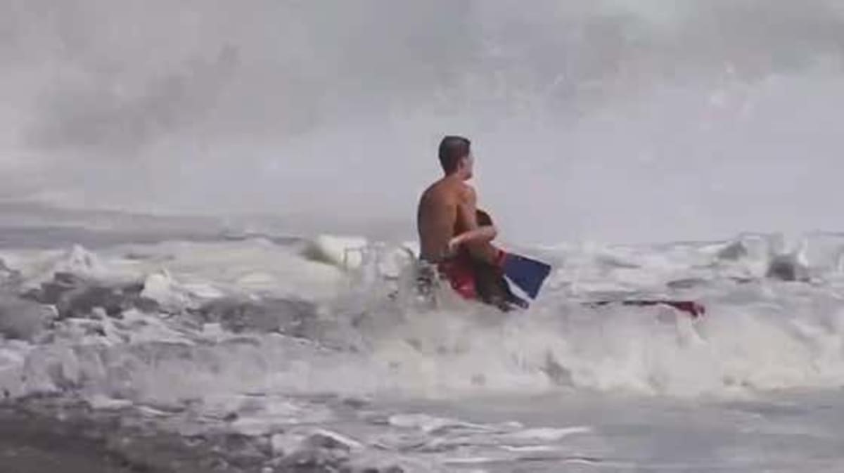 16-Year-Old Lifeguard Saves Boy from Tsunami-Like Waves