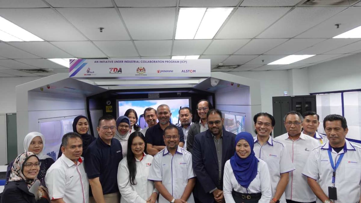 Train operators viewing Malaysia's first collaborative railway driving simulator at Kompleks Rapid Rail Subang