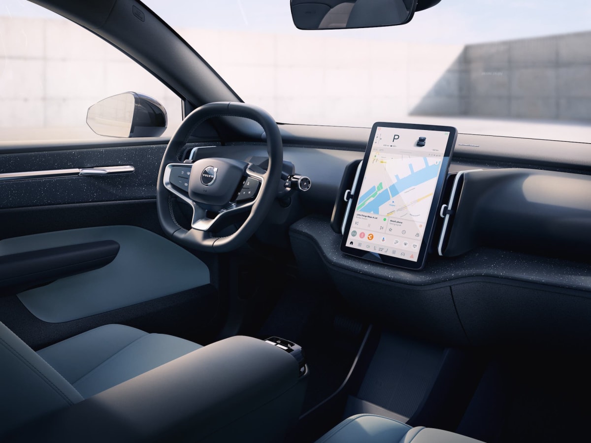 Modern connected car dashboard displaying digital screens and data collection technology