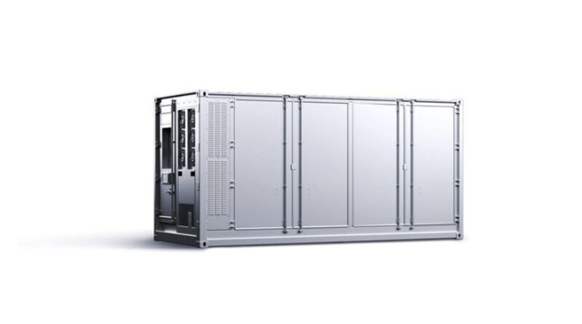 Large-scale battery storage facility with rows of energy storage units supporting renewable power grid