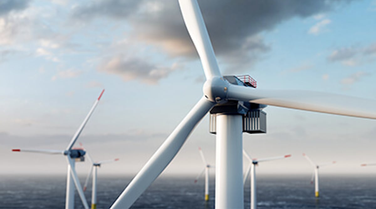 Offshore wind turbines rising from ocean waters delivering clean electricity to coastal communities