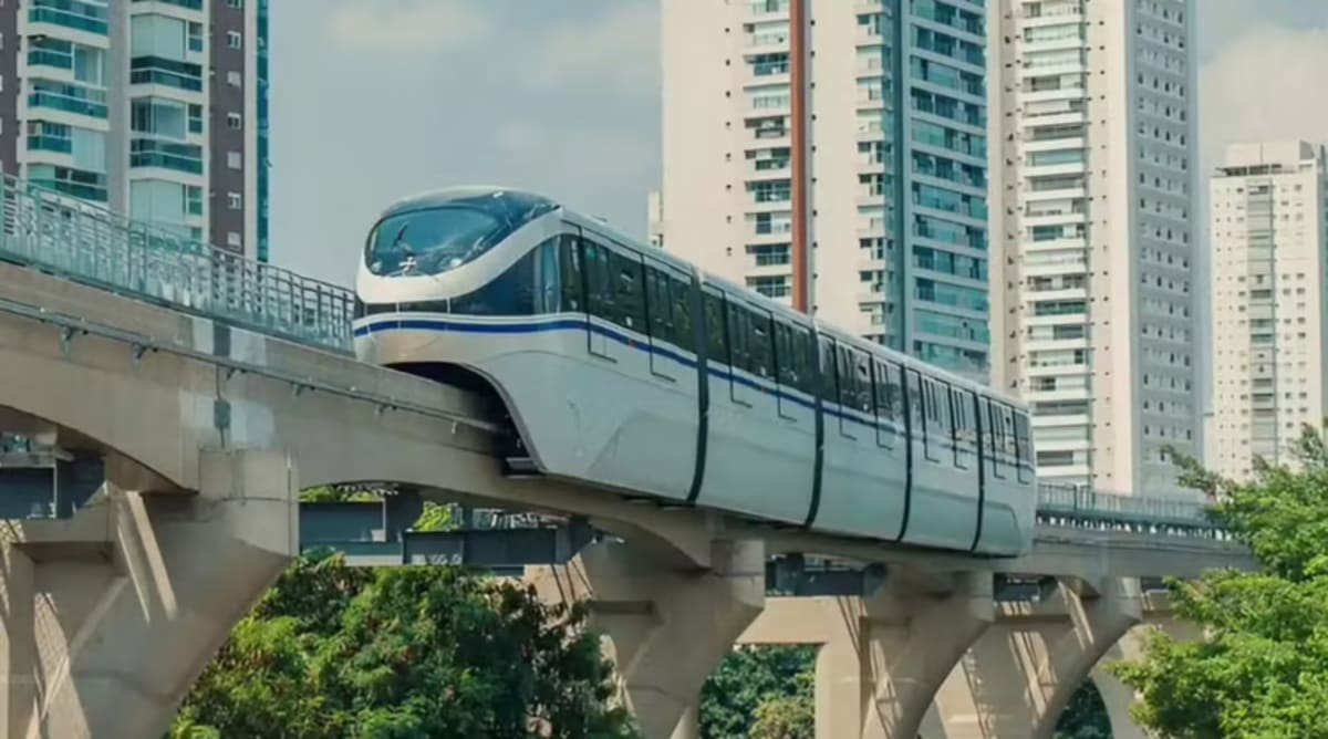 Elevated electric SkyRail train on narrow concrete beam in São Paulo, Brazil