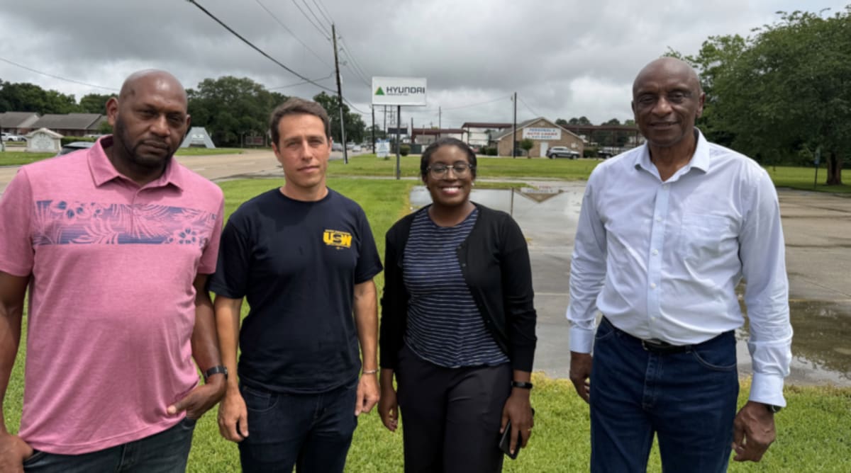 Community coalition members delivering documents to Hyundai offices in Louisiana demanding worker and environmental protections