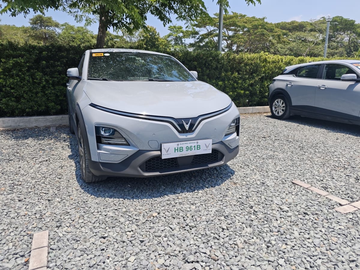 White VinFast VF6 compact electric crossover SUV with sleek European-inspired minimalist design