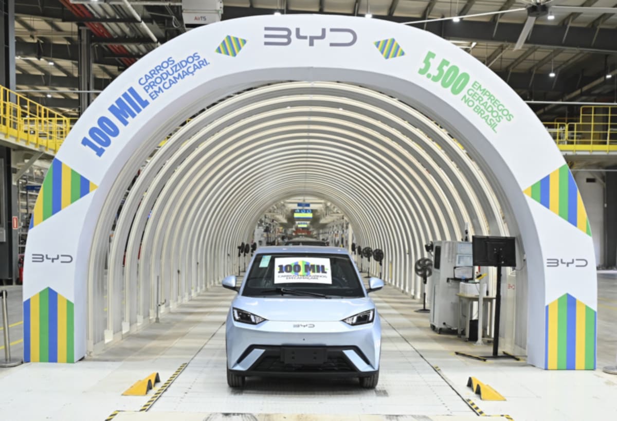 Electric vehicles on BYD production line in Camaçari, Brazil factory with workers