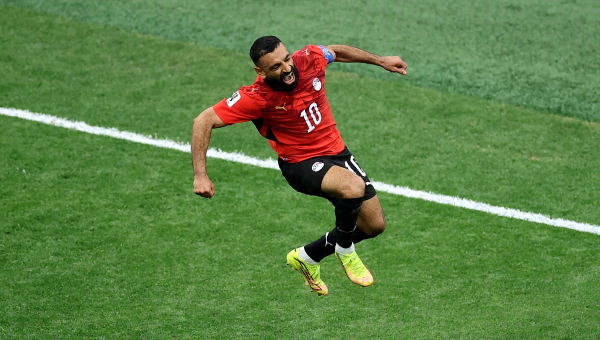 Mohamed Salah celebrates in Egyptian national team jersey after scoring World Cup goal