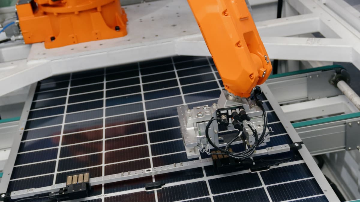 ** Robotic laboratory equipment conducting automated solar cell experiments with precision instruments