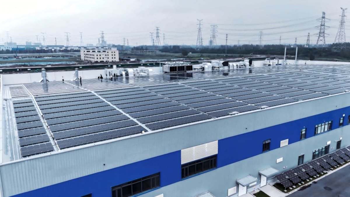 ** Modern perovskite solar panels installed outdoors during efficiency testing in bright sunlight