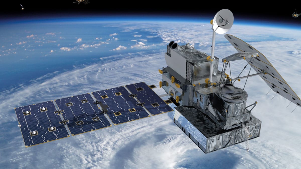 ** Advanced computer memory chip designed for satellite use floating above Earth's curved horizon