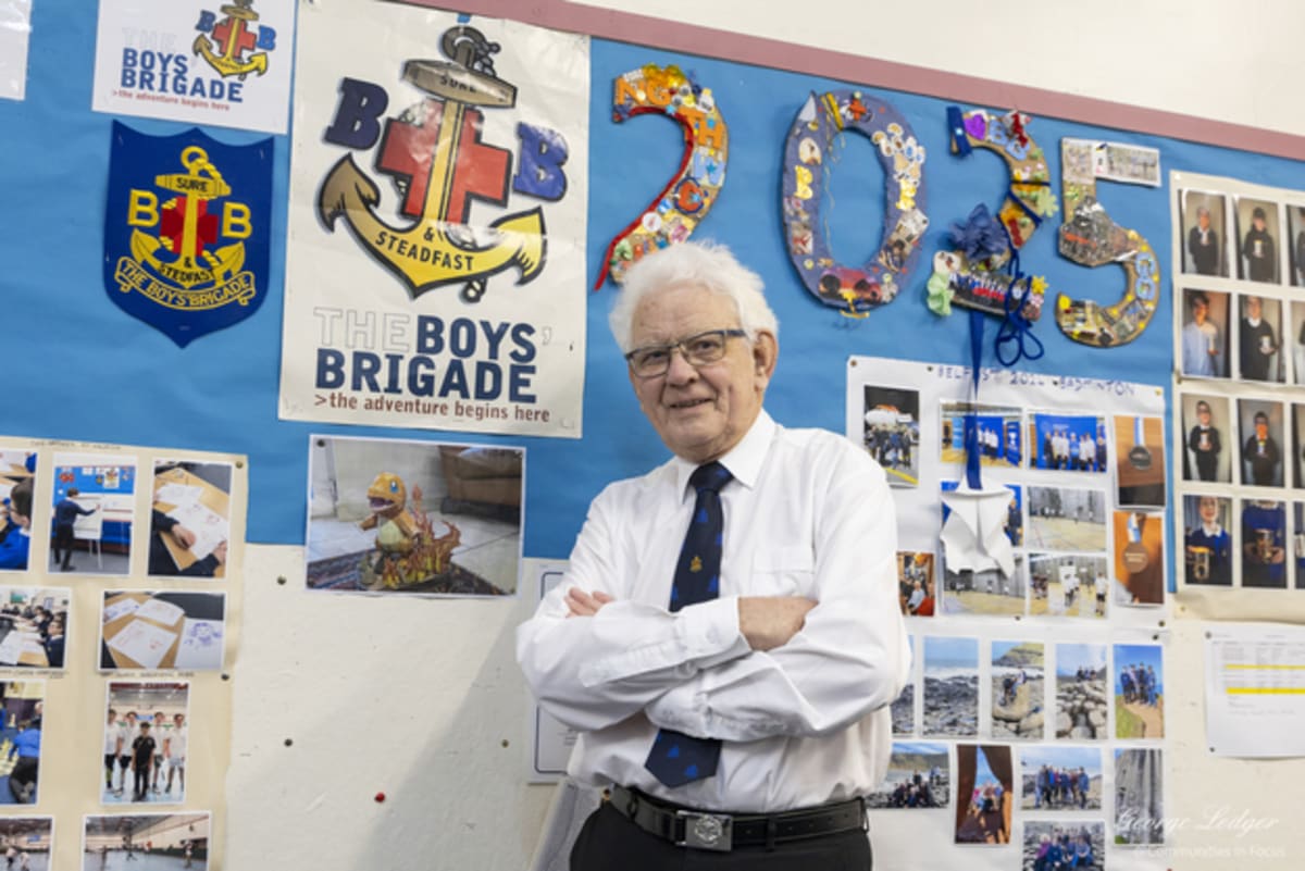 Eric Hepplewhite standing in Lanchester Boys' Brigade hall where he has volunteered for four decades