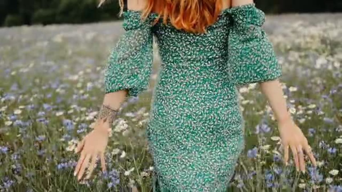 Sunita Ahuja and Krushna Abhishek embracing warmly on Laughter Chefs television set