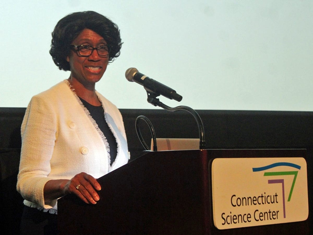 Connecticut Education Commissioner Charlene Russell-Tucker speaking at podium during education event