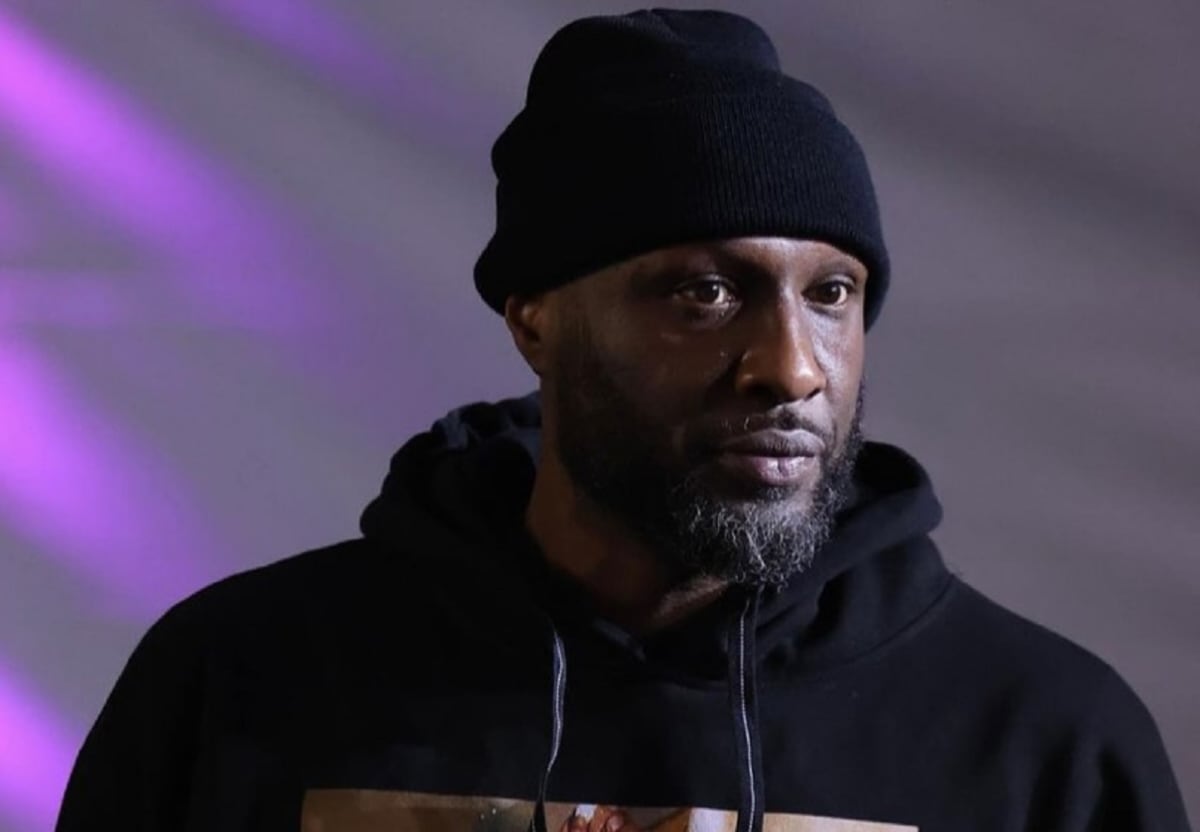 Former NBA star Lamar Odom smiling, representing his miraculous recovery from near-fatal 2015 overdose