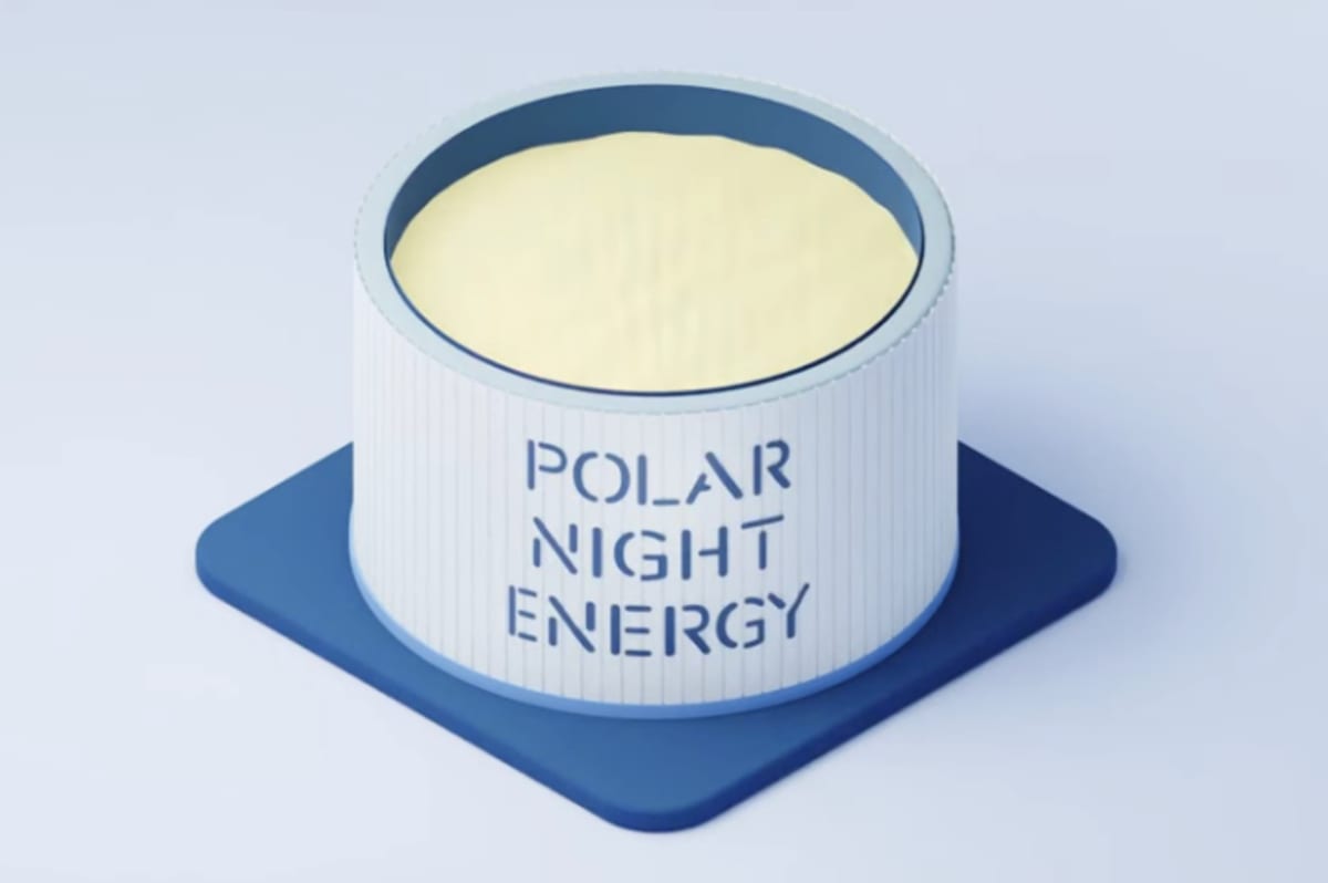 Glowing heated sand in industrial storage container for renewable energy system in Finland