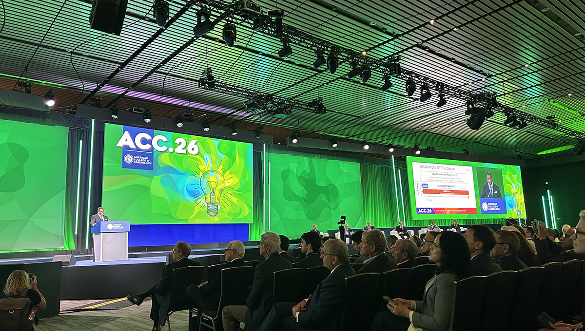 ** Medical illustration showing Watchman FLX device implanted in heart's left atrial appendage chamber