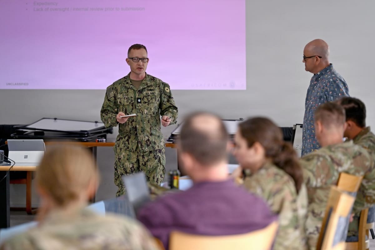 U.S. Navy Commander gives presentation during Innovation Project Leaders Course in Stuttgart, Germany