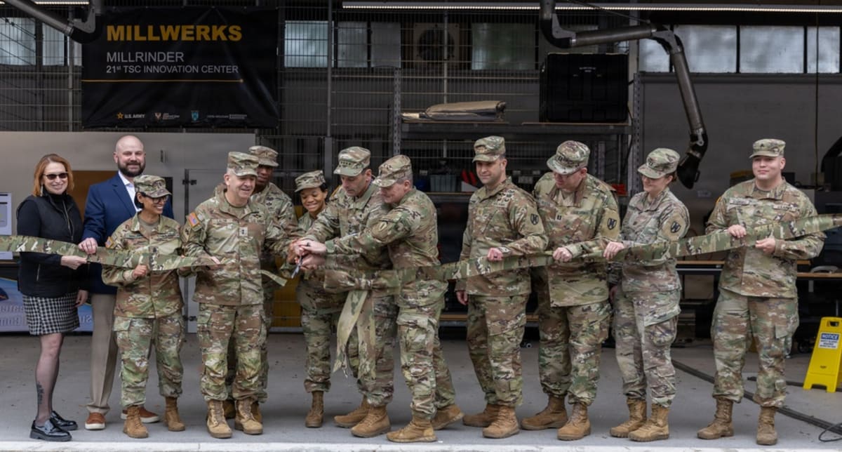 Military leaders cutting ribbon at grand opening of innovation center in Germany