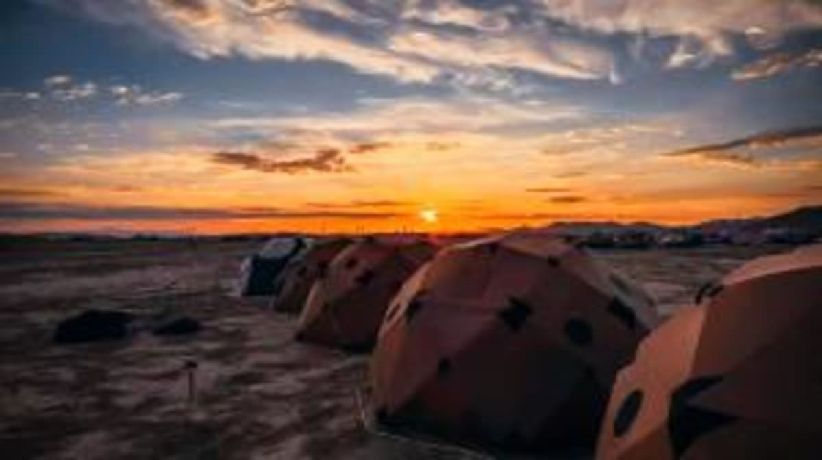 Solar panels and portable power stations operating in Nevada's Black Rock Desert during Burning Man festival