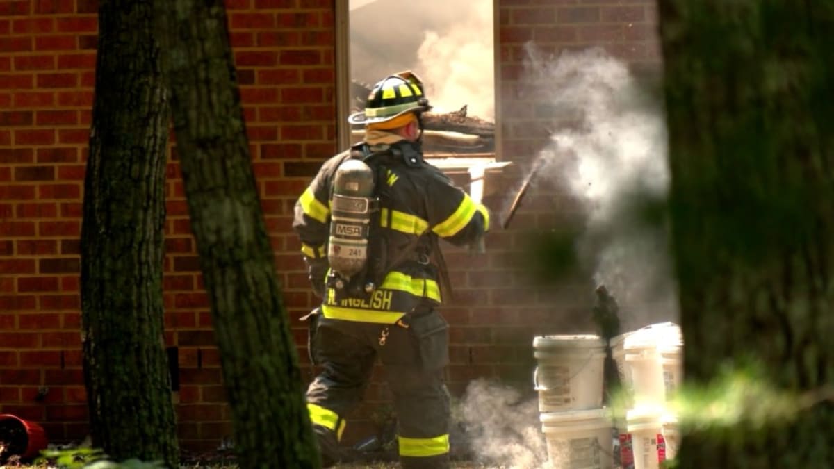 Veteran firefighter Steve Weissman in uniform reflecting on Virginia's new cancer screening program