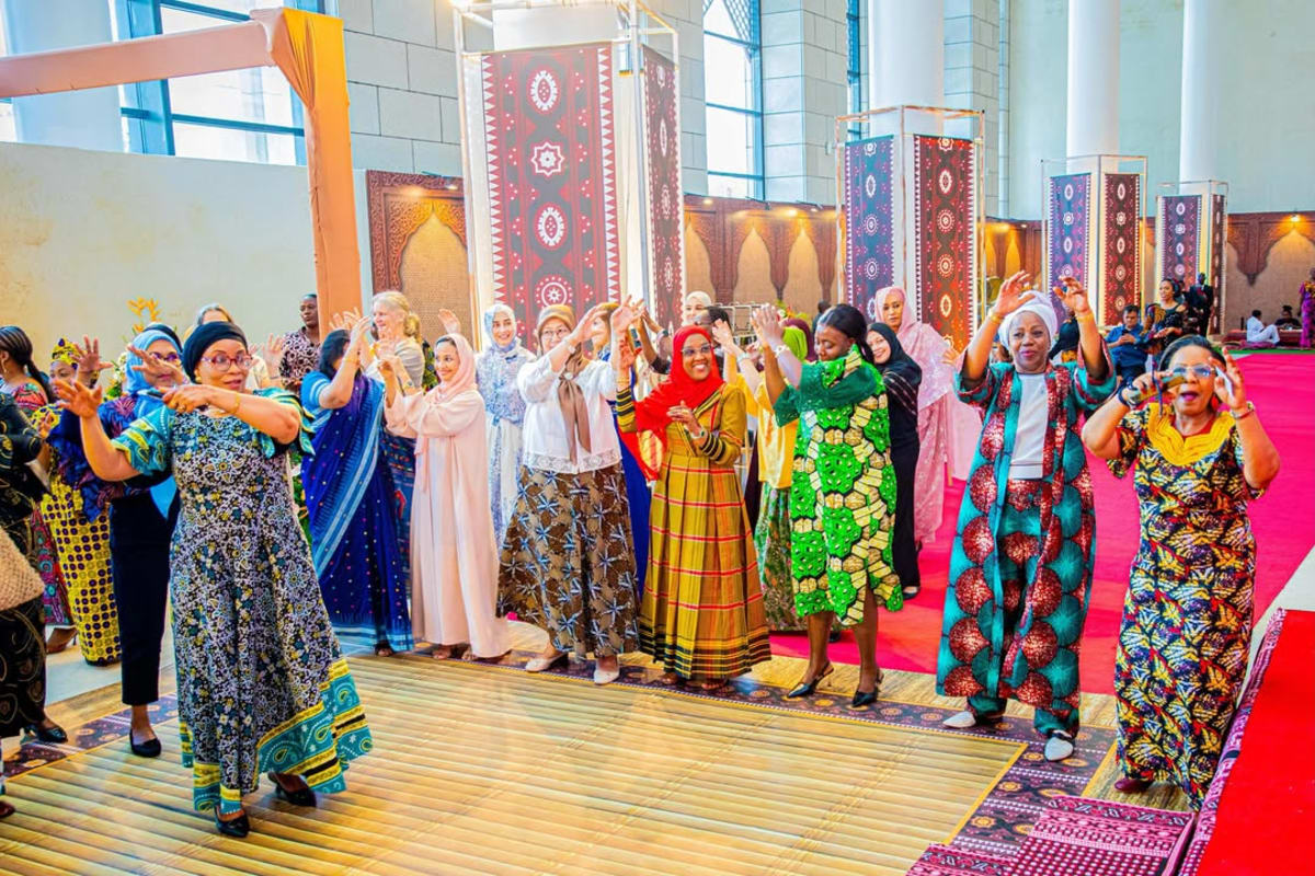 Diplomatic families enjoying traditional Swahili cultural activities and cuisine at inaugural Africa Day brunch in Dar es Salaam