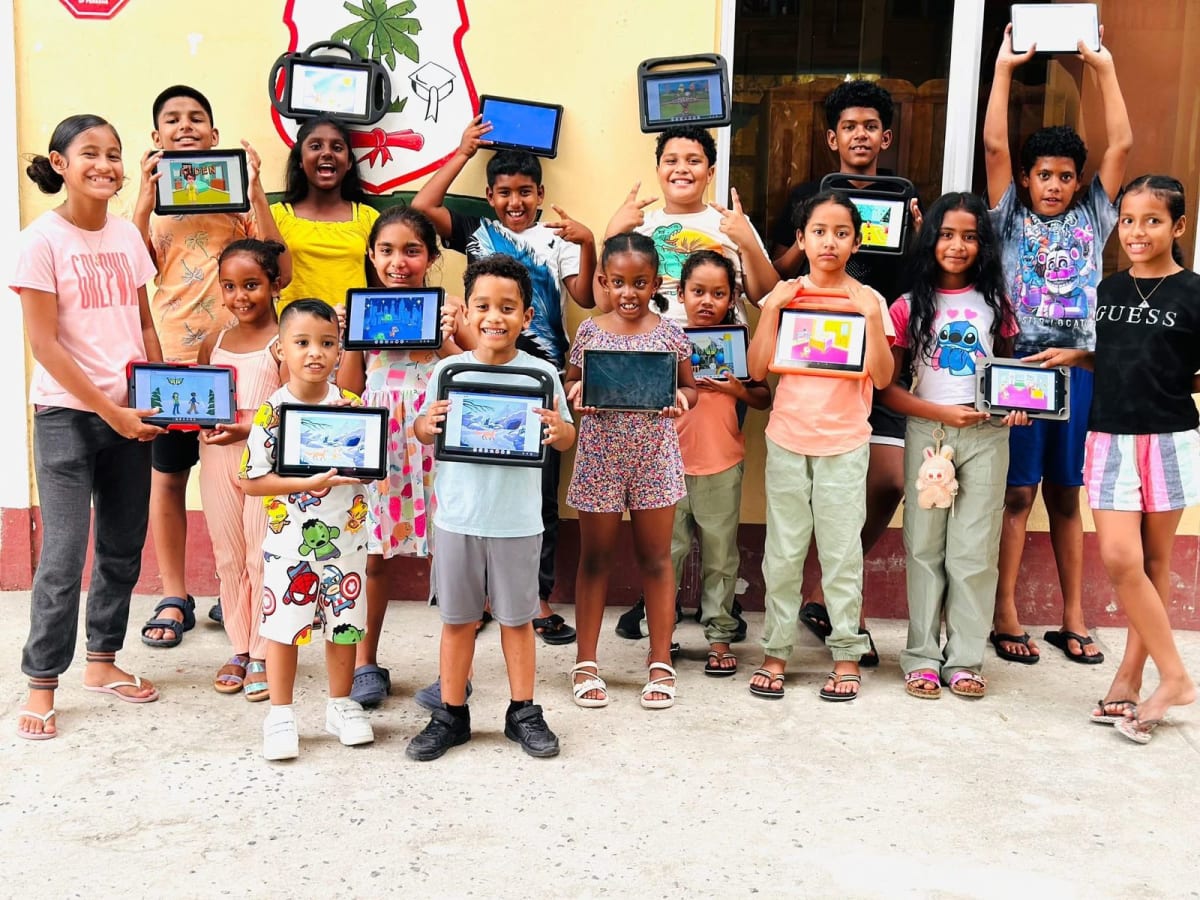 Students work together on robotics project at Caribbean regional technology education competition