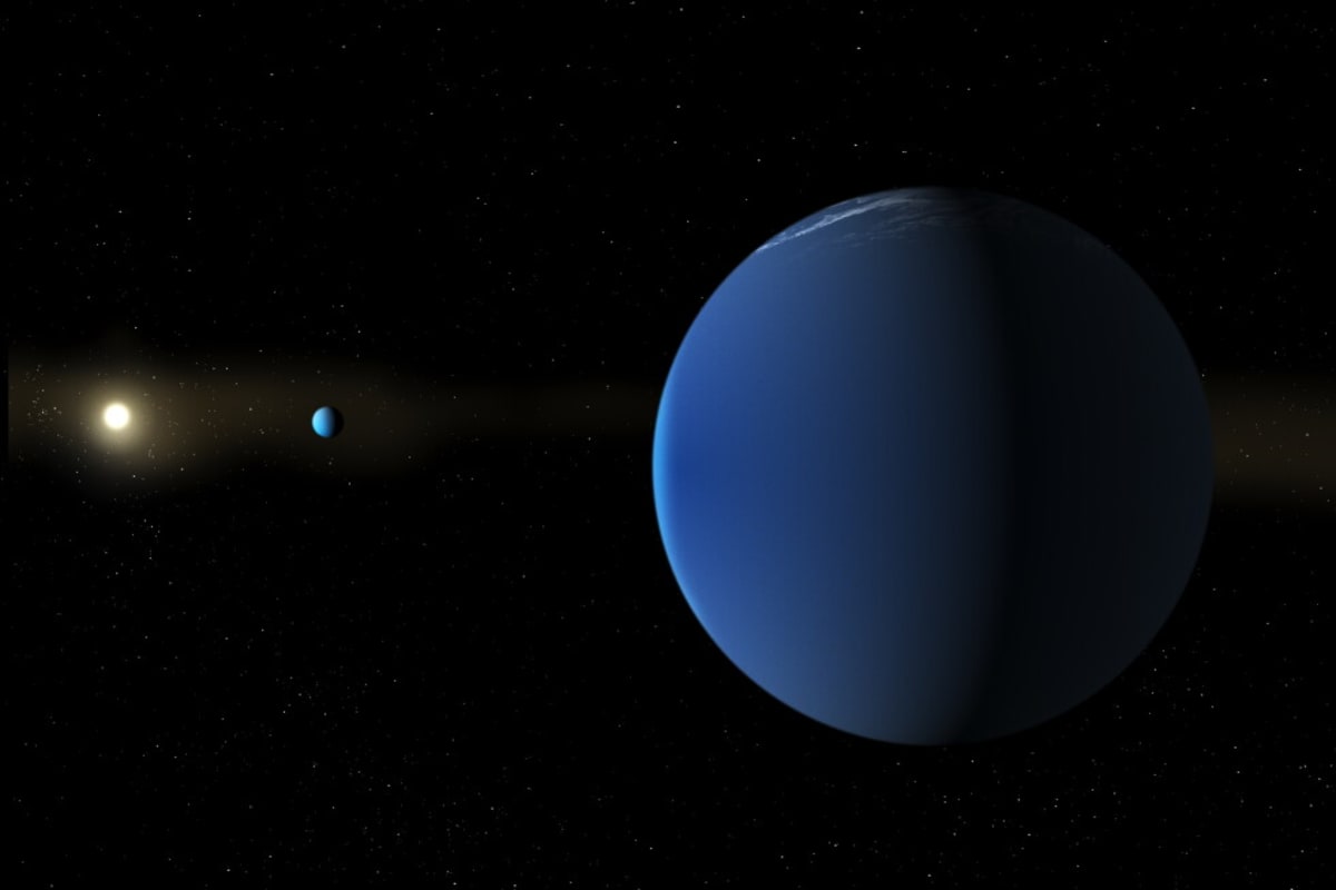 ** Artist rendering of a massive fluffy super-puff planet floating in space with swirling light atmosphere
