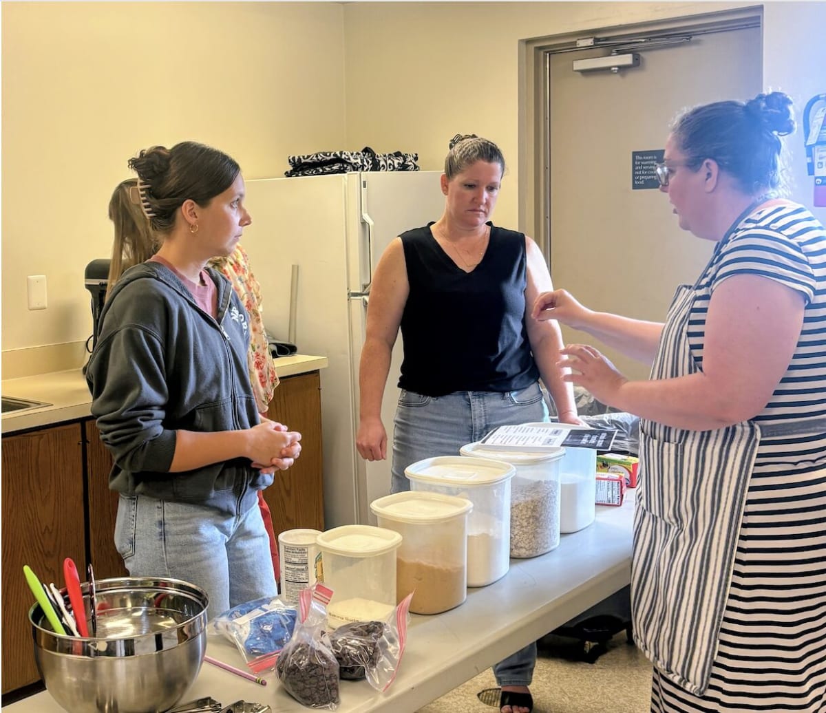 60 Women Assemble 117 Meal Kits for Struggling Families