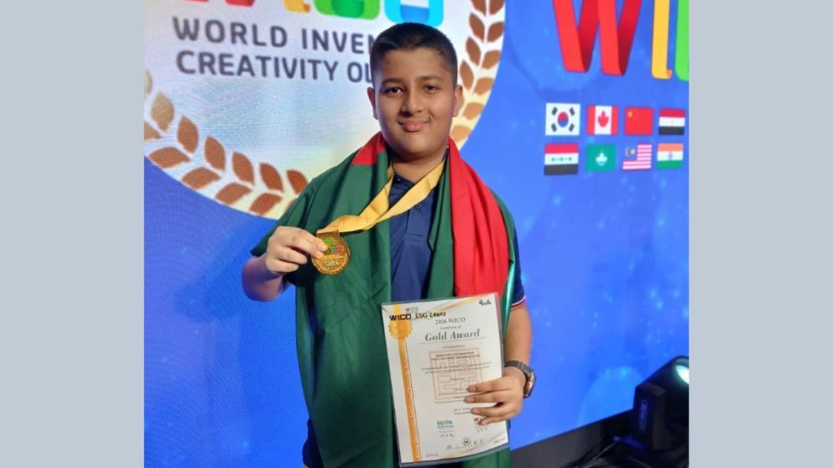 Young Bangladeshi students holding medals at international robotics competition in South Korea