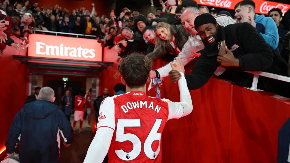 Young soccer player Max Dowman celebrating in Arsenal red jersey after scoring historic goal