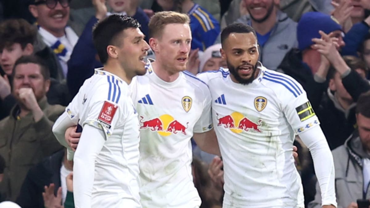 Sean Longstaff celebrates with Leeds United teammates after scoring opening goal against Norwich