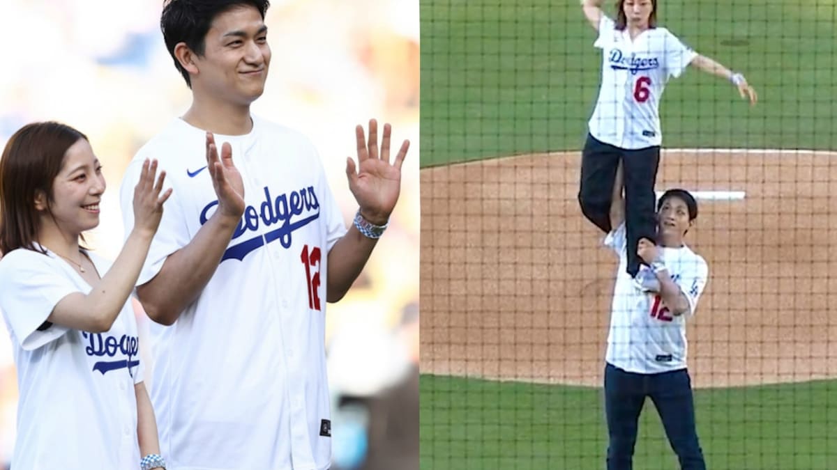 Japanese Olympic figure skaters Riku Miura and Ryuichi Kihara performing aerial first pitch at Dodger Stadium