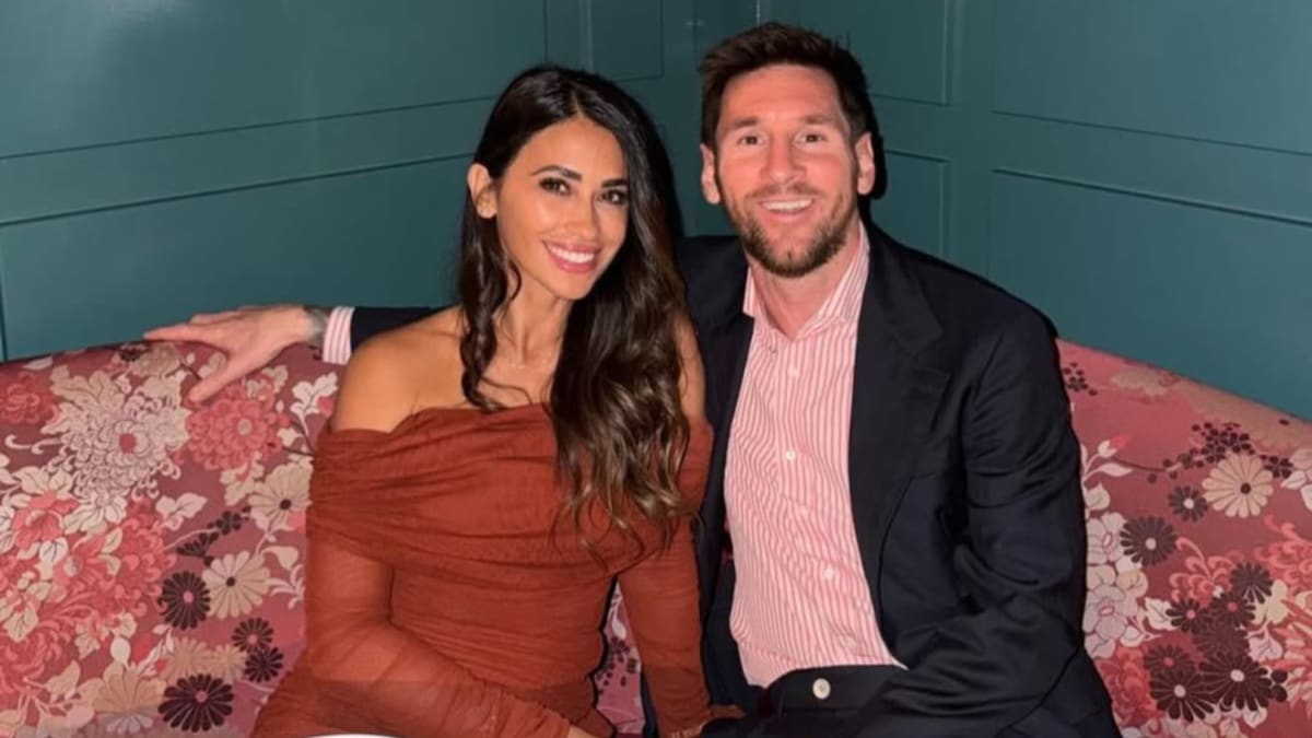 Lionel Messi embracing his wife Antonela and three sons during World Cup family reunion