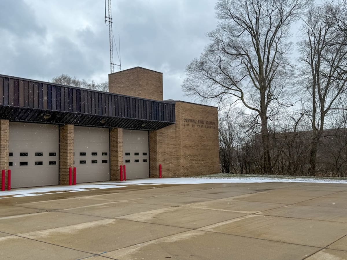 East Lansing firefighters practicing water rescue techniques in river during training exercise