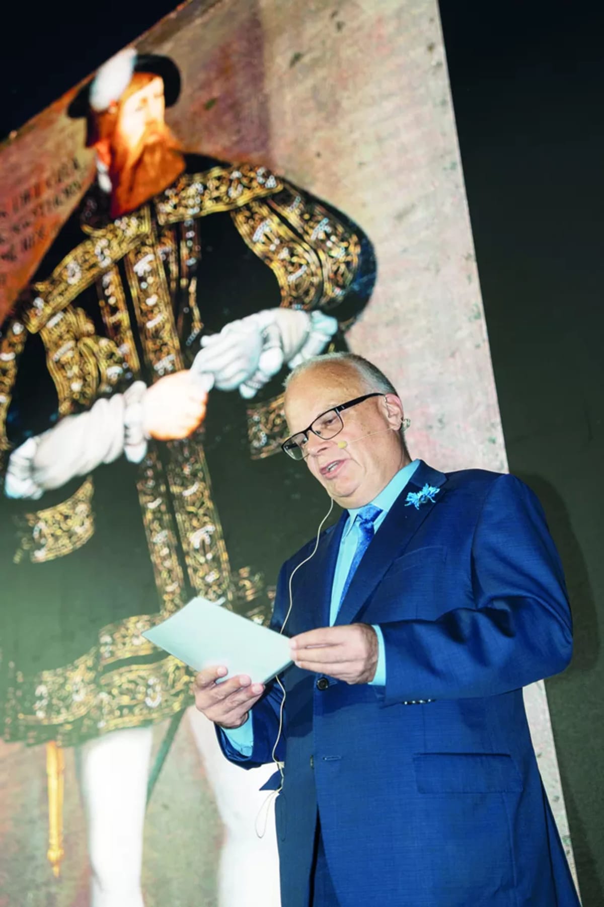 Swedish and Egyptian officials gather at outdoor midsummer celebration with company exhibition displays in Cairo