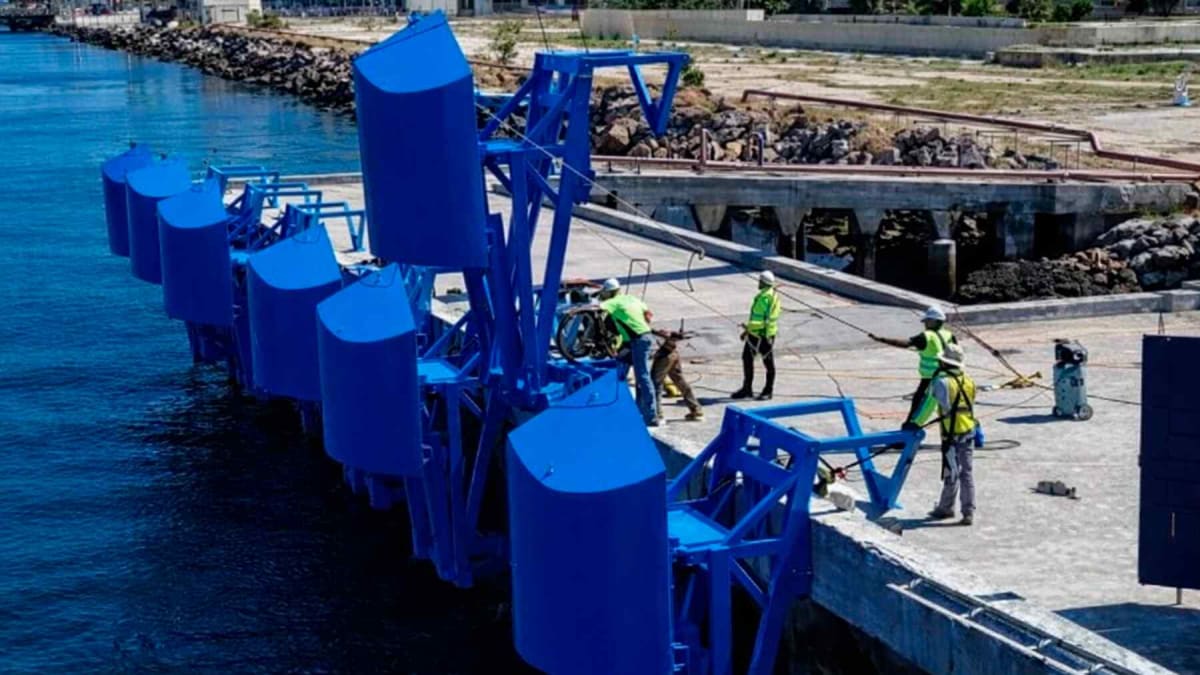 Wave energy floaters attached to Los Angeles port breakwater generating clean electricity from ocean waves