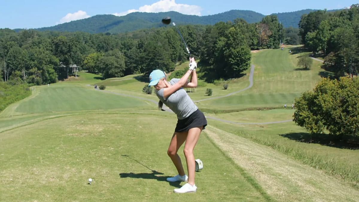 Truett McConnell University women's golf team members celebrating academic achievement on campus