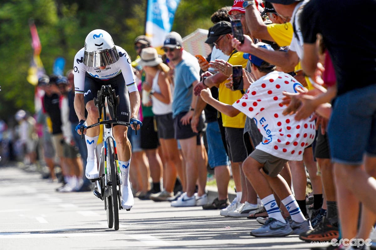 Swiss cyclist Marlen Reusser racing in rainbow world champion jersey during time trial