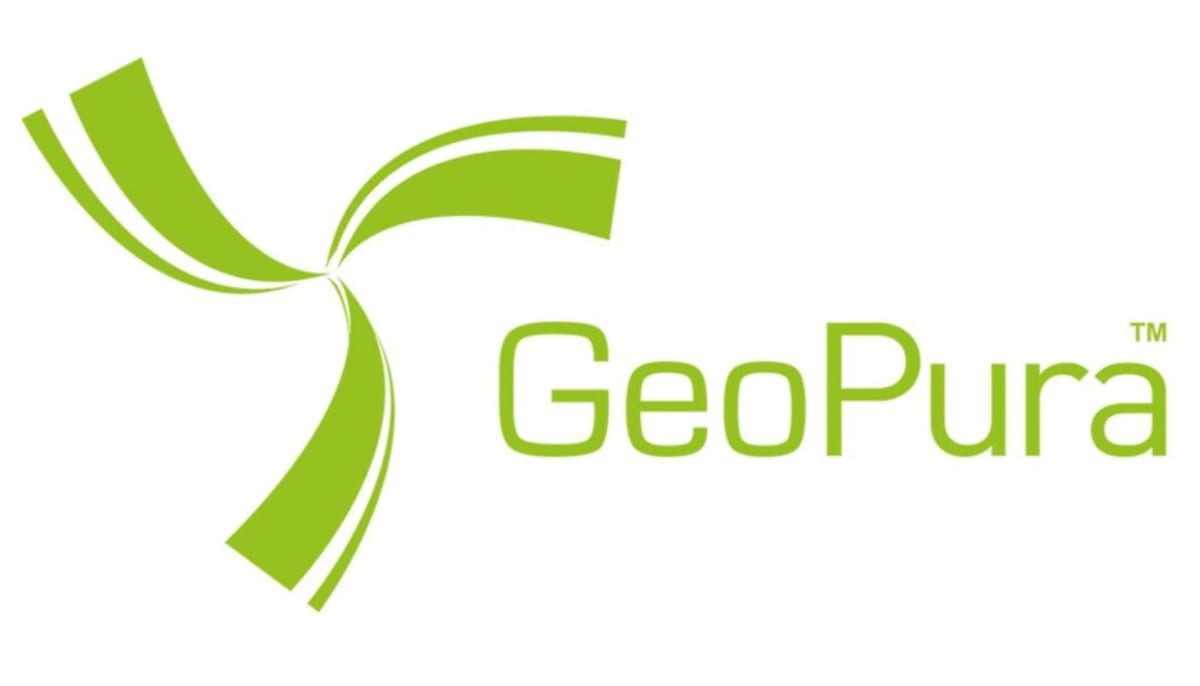 Green hydrogen generator powering construction equipment at British road project site with zero emissions