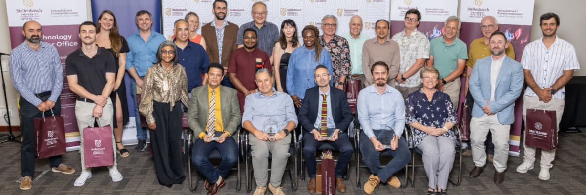 Researchers at awards ceremony celebrating patents and innovation achievements at Stellenbosch University