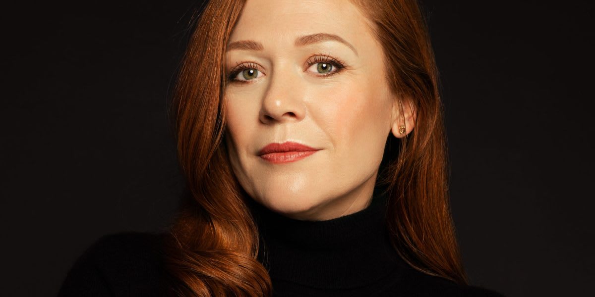 Bree McKeen founder of Evelyn and Bobbie holding patented wireless supportive bra design