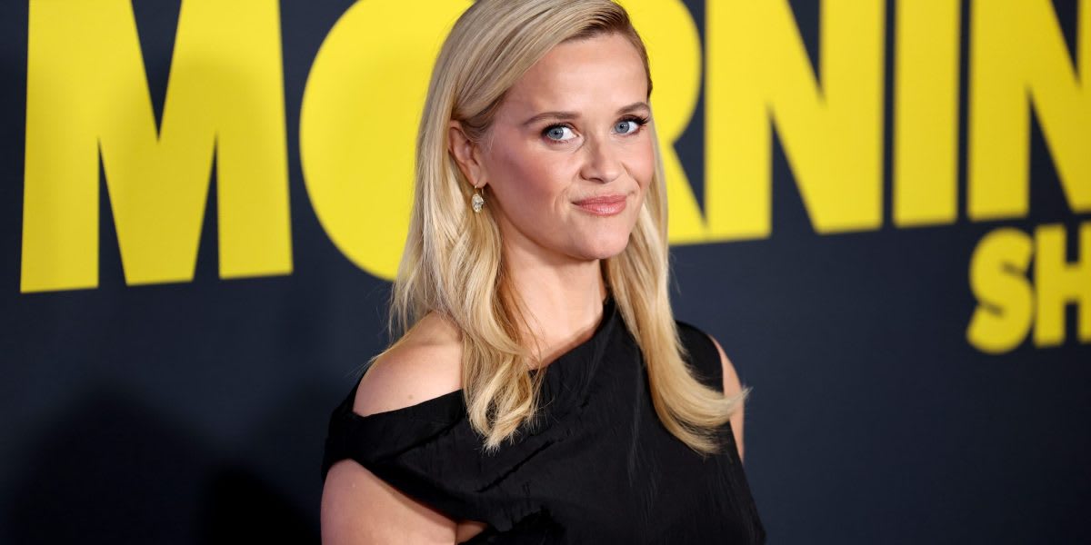 Reese Witherspoon smiling confidently, founder of Hello Sunshine media company valued at $900 million