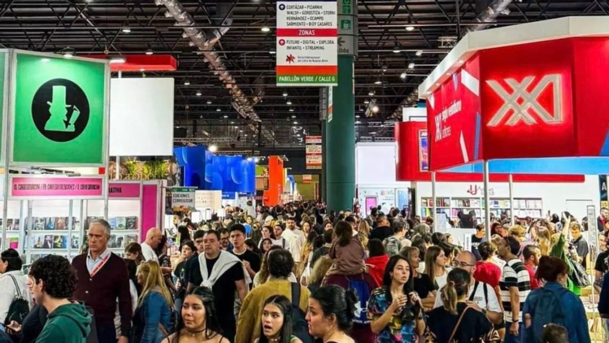 Colorful book displays and visitors browsing at Buenos Aires International Book Fair exhibition space