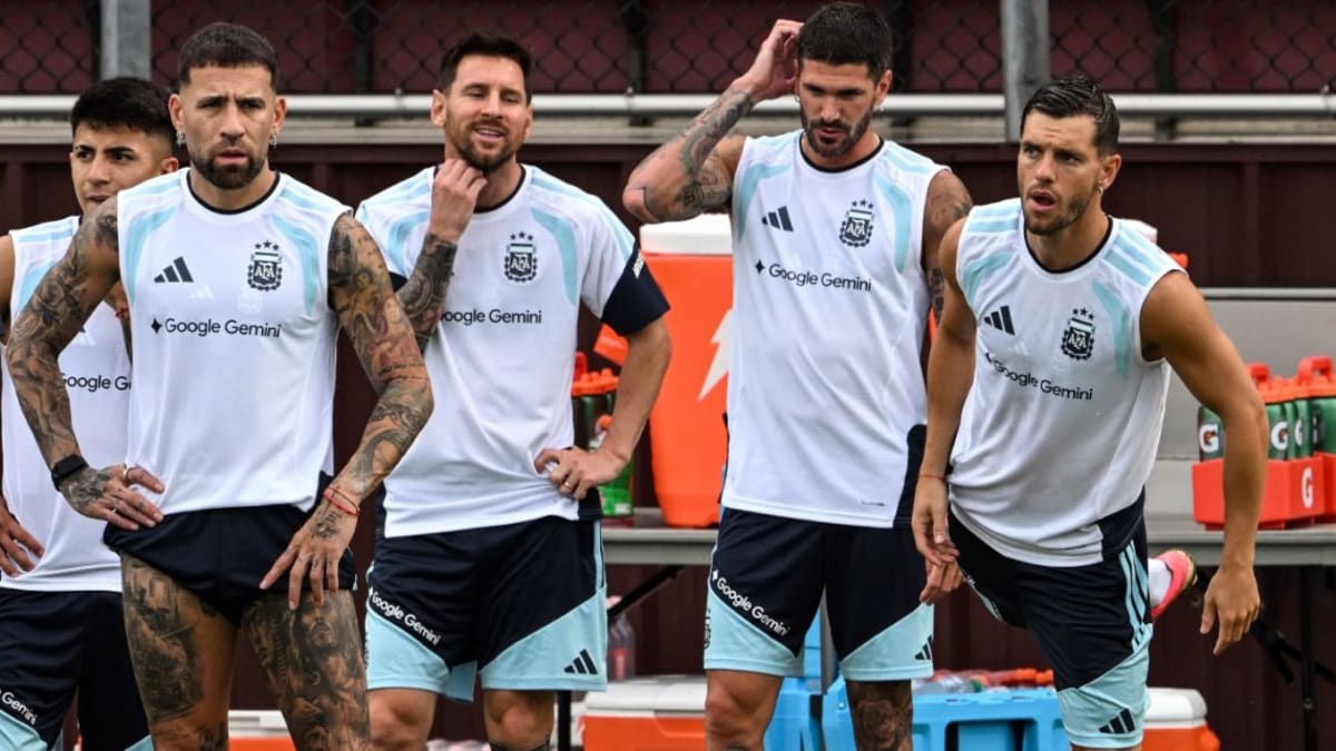 Lionel Messi in Argentina jersey celebrating with teammates after scoring against Iceland