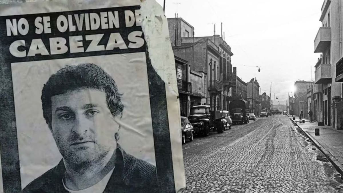 Street sign reading José Luis Cabezas on Buenos Aires avenue honoring murdered photographer