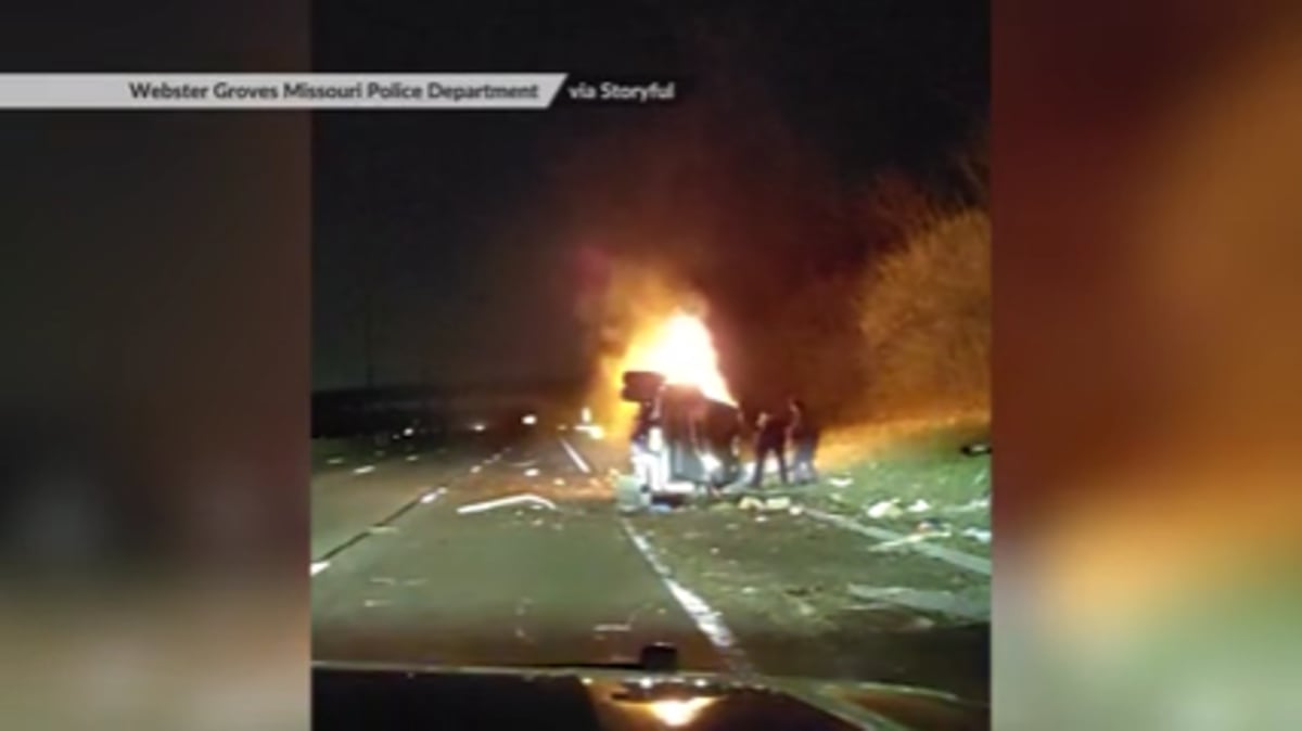 Officer Smashes Sunroof to Save Driver From Burning Car