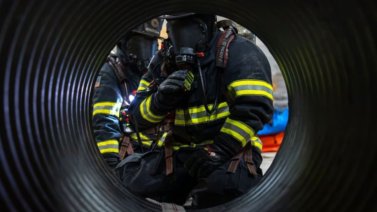 Valdosta firefighters practicing blindfolded rescue drill during intensive training session in Georgia