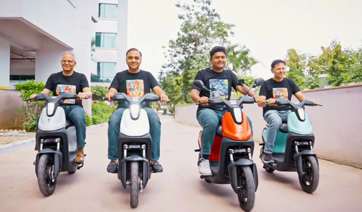 Electric two-wheeler scooters lined up on Bengaluru street ready for shared mobility service