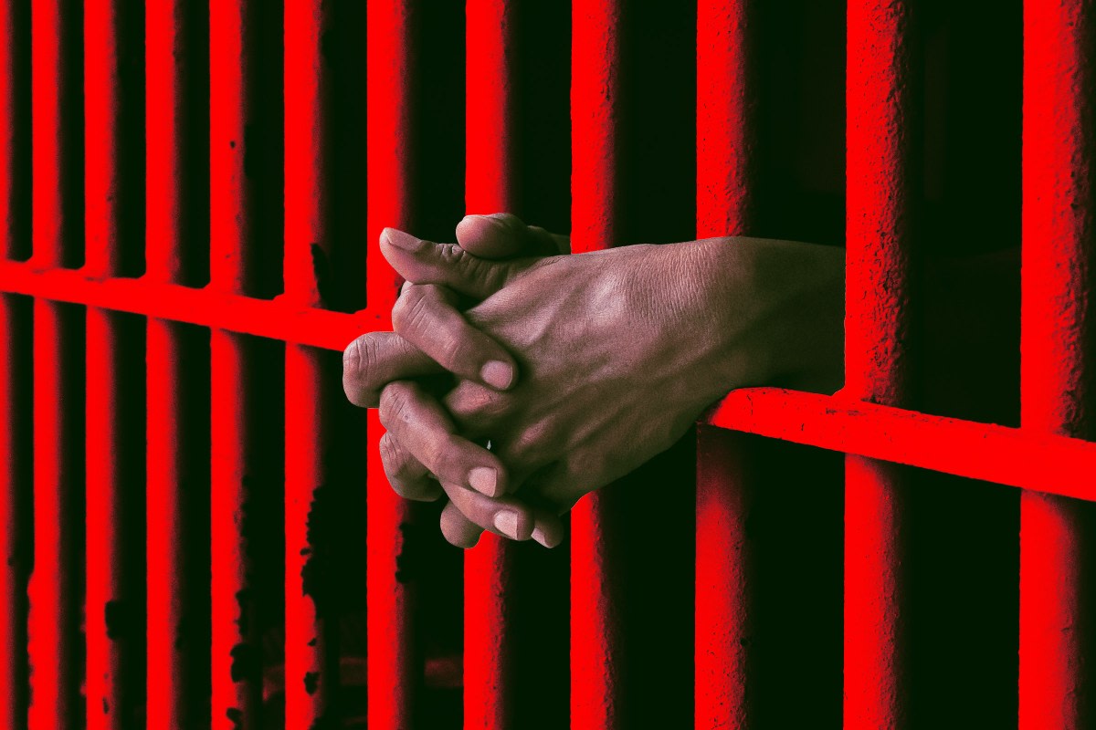 ** Man standing outside courthouse after wrongful arrest due to facial recognition error